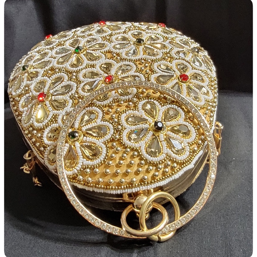 Egg shaped golden clutch
